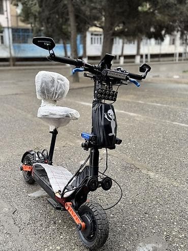 bokus elceyi: Elektrik skuter – oturacaqlı, güclü işıqlandırma və aksesuarlarla — 1