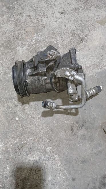 ateko turbo az: Denso markalı, qara rəngdə, dairəvi formalı kompressor. Kondisioner — 2