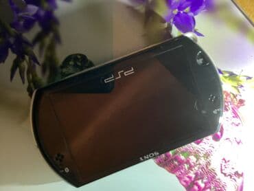 oyunlar: Psp go,yaxsi veziyyetdedir,2009 model,ekranda xırda cızıqlar — 1