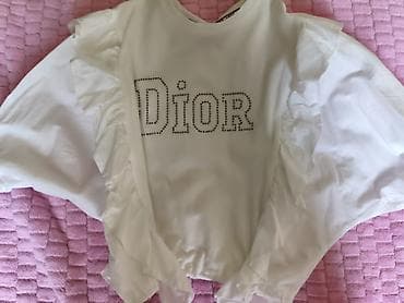 dior canta: Ağ rəngli qız uşağı köynəyi/bluz. Ön hissədə “Dior” yazısı daşlarla — 1
