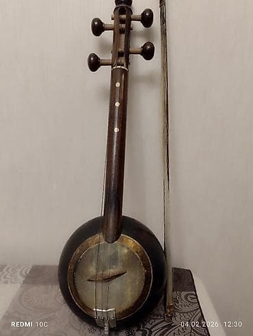 Fleytalar: Kamança satilir keçmişindi esl agacdan. Bir yerində qırığı var — 2