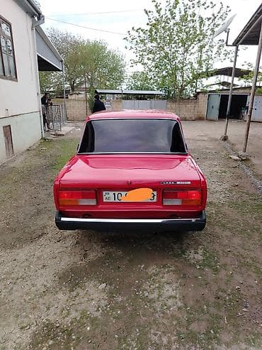 pajero io satilir: LADA 2107, qırmızı rəng, sedan kuzov. - Mühərrik: benzinli, arxa — 2