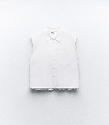 Ağ rəngli, qolsuz köynək/bluz. - Brend: ZARA (etiketdə görünür). - — 9