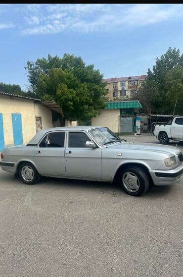QAZ: QAZ 3110: 2.3 l | 2003 il Sedan