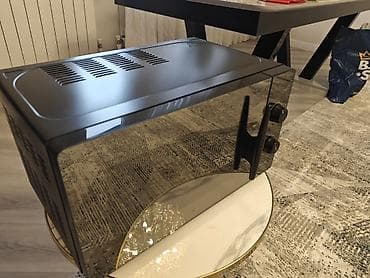 irşad electronics sobalar: Mikrodalğalı soba Ayrıca dayanan, Mikrodalğalar ilə, rəng - Qara, İşlənmiş — 1