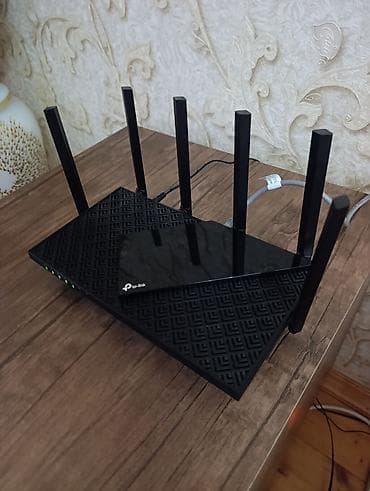 modem satilir: TP-Link Archer AX72 (AX5400) Wi‑Fi 6 router - İki zolaqlı (Dual‑Band) — 2