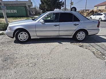 195 65 15 teker: Mercedes-Benz C-Sinif sedan, gümüş rəng. - Kuzov: 4 qapı, klassik W202 — 6