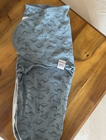 Bələk yenidoğulandan ki,uşaq yatanda diksinib,əlini üzünə aparıb