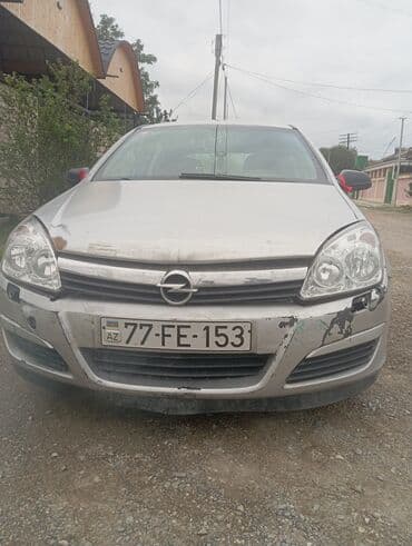 Opel Astra GTC, 5 qapılı hetçbek Əsas xüsusiyyətlər: - Gümüşü rəng -