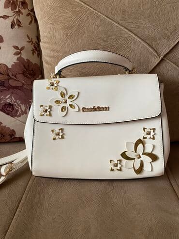 Toy paltarları və aksesuarları: Canta . Moskvadan alinib . Hec işlənməyib 15 — 1