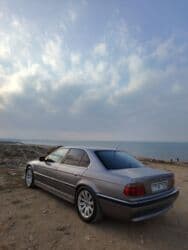mersedes c 230: BMW 735: 3.5 l | 1998 il Sedan — 5