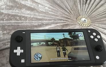 Digər oyun və konsollar: Nintendo Switch Lite tipli əl konsolu Xüsusiyyətlər: - Kompakt — 1