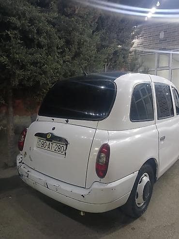 kamazlarin satisi: LTI TX4 London Taxi – klassik taksi dizaynlı, geniş və rahat salonlu — 10