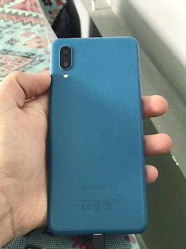 iphone 11 pro qara: Samsung Galaxy A02, 32 GB, rəng - Göy, İki sim kartlı, Face ID — 1