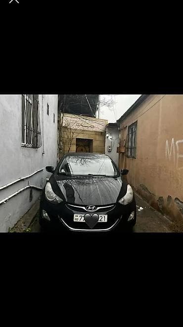 04 baqajı: Hyundai Elantra: 1.8 l | 2014 il Sedan — 2