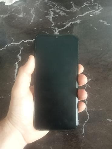 Мобильные телефоны и аксессуары: Barter. var.Qara rəngli, naxışlı arxa örtüyə malik smartfon. Cihazın — 3