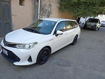 corolla cros: Toyota Corolla Fielder Hybrid, ağ rəng, universaI kuzov. Texniki — 4