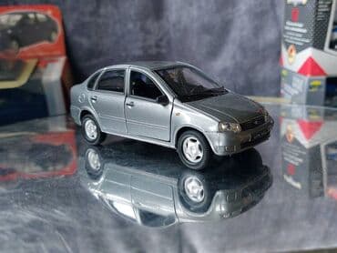 metbex tavan modelleri: Коллекционная модель Lada Kalina VAZ1118 silver 2004 Welly Scale — 8