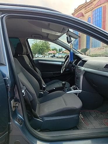 winda teker evi: Opel Astra H Caravan (universal kuzov) - Kuzov: universal, 5 qapı - — 10