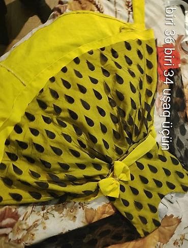 Uşaq paltarı – sarı-yaşıl tonlarda, qara damcı naxışlı - Ölçülər: biri