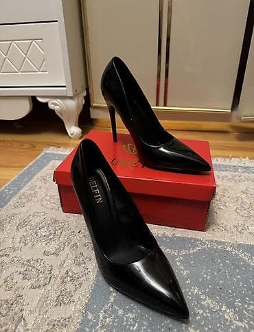 Qara rəngli klassik stiletto tuflilər
Yenı kımı 1defe geyınılıb 38