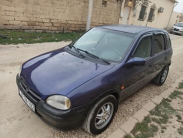 teker 14: Opel Corsa B, 5 qapı, tünd bənövşəyi rəngli hetçbek. Xüsusiyyətlər: - — 4