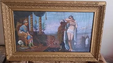 Qədim divardan asılan şəkillər satılır