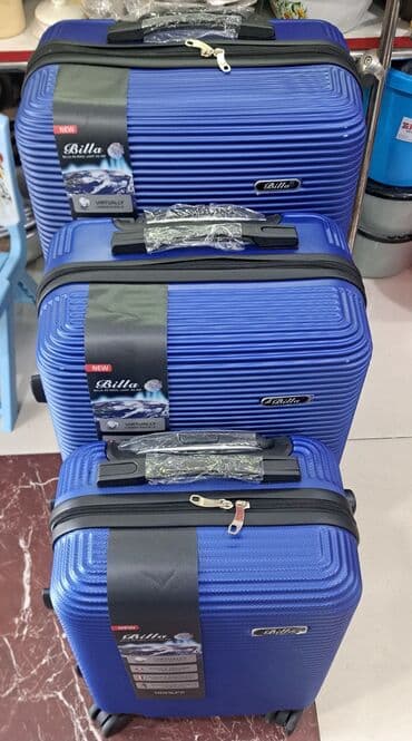 Maskalar, eynəklər: Fərqli ölçülərdə üç ədəd qara rəngli səyahət çantası dəsti. Hər bir — 3