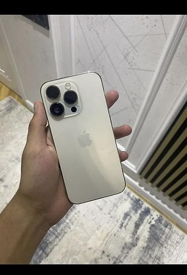 Elektronika: IPhone 14 Pro, 128 GB, Matte Gold, Barmaq izi, Face ID, Simsiz şarj — 1