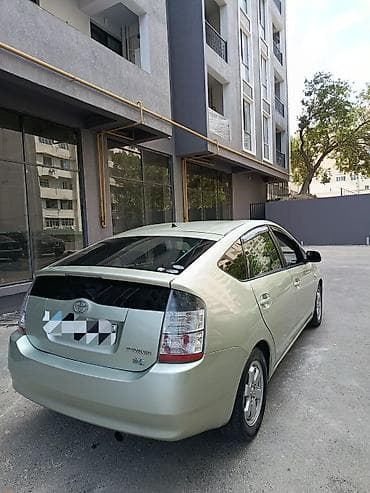 Toyota Prius (2-ci nəsil) hibrid hetçbek - Rəng: açıq yaşıl/metalik - — 2