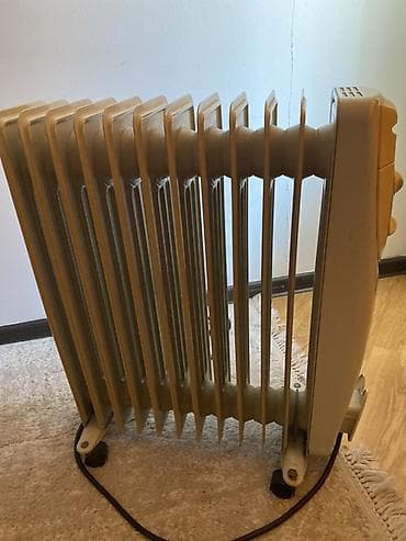 Kondisionerlər: Beko yağlı radiator tipli elektrik qızdırıcısı - Paneldə mexaniki — 1