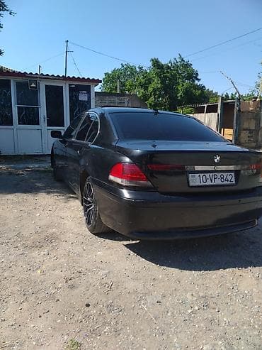 opel vectra a: BMW 7 Series (E65) sedan – qara rəngli, tam ölçülü premium sedan — 3