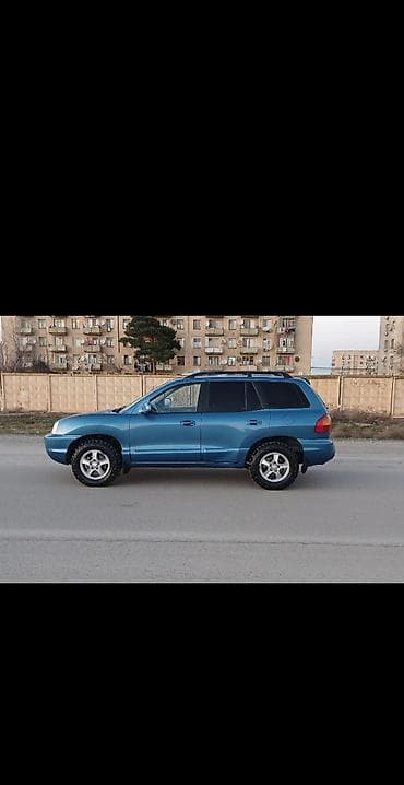 ij disklər: Hyundai Santa Fe – mavi rəngli, 5 qapılı SUV. Texniki və dizayn — 3