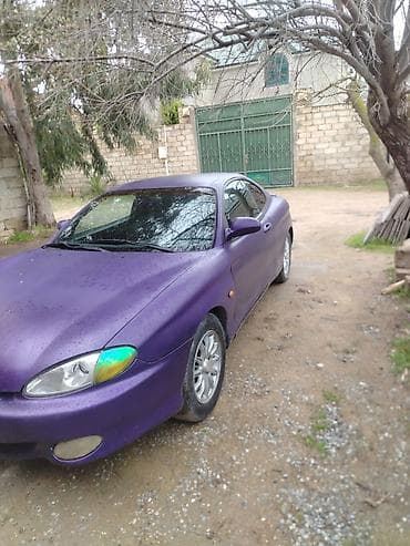 hundai cupe: Hyundai Tiburon: 1.8 l | 1997 il Kupe — 2