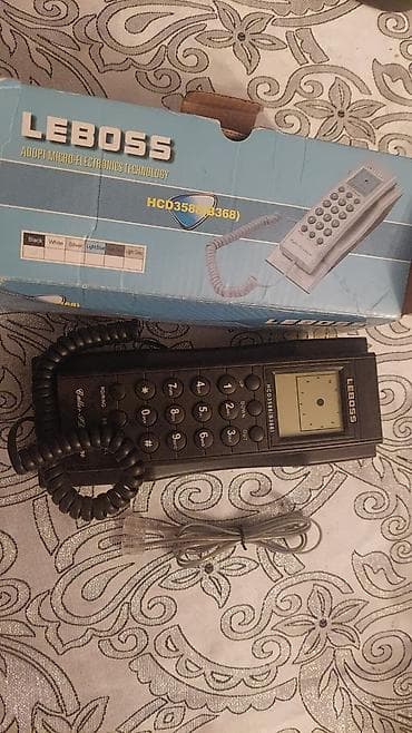Stasionar telefon Simli
