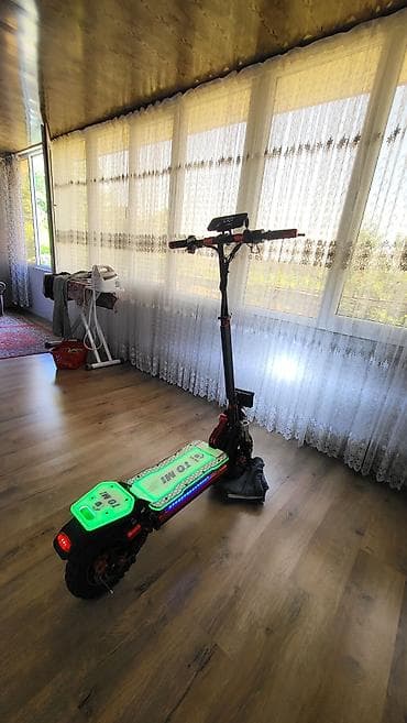 ucuz gitara: Elektrik skuter – TOMI brendi Xüsusiyyətlər: - Güclü ikili — 10