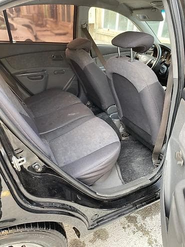 priora guzgu: Kia Rio hatchback – CRDI dizel - Korpus: 5 qapılı hatchback, qara — 6