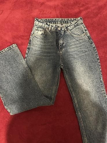 cinsler: Yüksək belli, asimmetrik kəsimli qadın cins şalvarı. Şalvar açıq mavi — 2