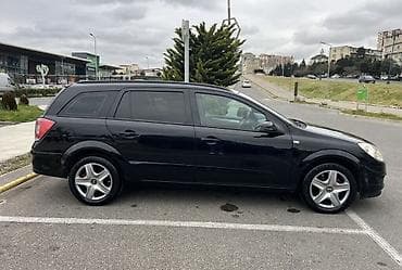 opel astra 2017: Opel Astra H Caravan (universal) – qara rəngdə, 5 qapılı şəhər və ailə — 7