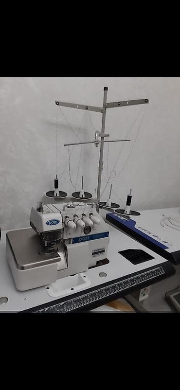 Tozsoranlar: Tikiş maşını Overlok, 4 saplı — 1