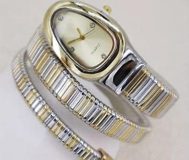 Qadın qol saatı – zərif spiral qolbaq dizaynı - Mexanizm: Kvars -