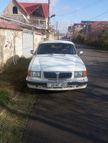 QAZ 3110: 4 l | 2002 il Sedan