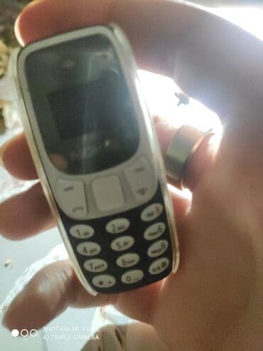 fly телефон раскладушка с большими кнопками: Ultra-mini klassik düyməli telefon - Çox kiçik ölçü: ovuca sığan — 1