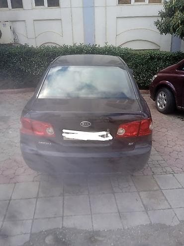 kia optima 2011: Kia Optima: 2 l | 2006 il Sedan — 2