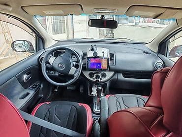 xrom diski: Nissan Note – bənövşəyi/marun rəngli kompakt hetçbek Xüsusiyyətlər: - — 9