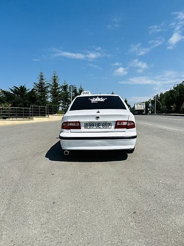 toy guzgusu: Saipa Saba (sedan) – ağ rəngdə, 4 qapılı, 5 yerlik şəhər sedanı — 4