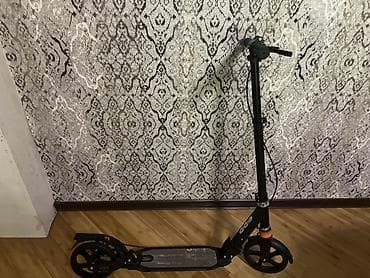 Şəhər gəzintiləri üçün yığcam şəhər skuter - Mexaniki (elektriksiz)