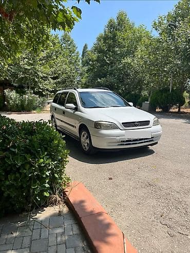 reno senik 2: Opel Astra: 1.8 л | Универсал — 4