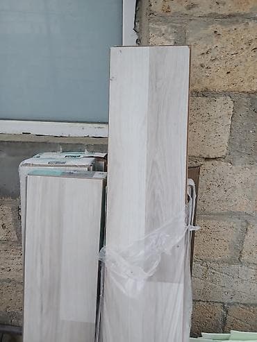 Məhsul: Laminat döşəmə taxtaları Yenidir istifade olunmayib.13kv — 3