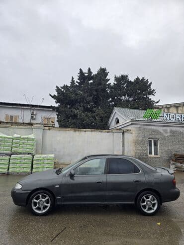 excel hyundai 1994: Hyundai Elantra: 1.6 l | 1996 il Sedan — 8